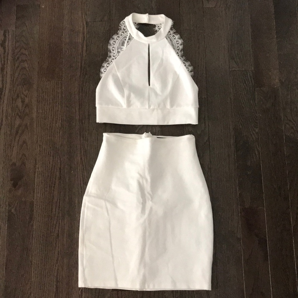 White two piece dress with lace back.
